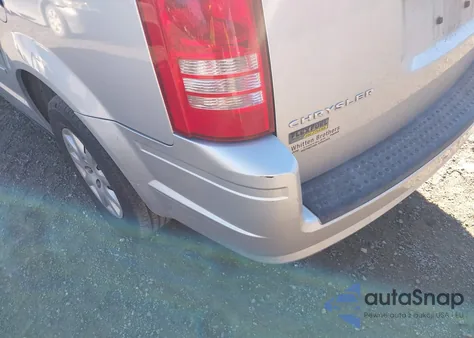 2010 Chrysler Town & Country Lx z USA, uszkodzony, nr VIN 2A4RR4DEXAR133232